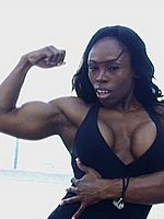super hot ebony female bodybuilder mistress treasure in ripped contest shape